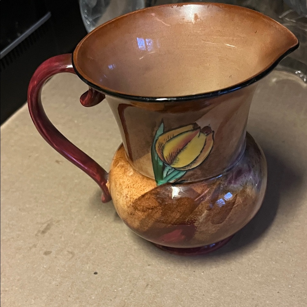 Artistic Ceramic Pitcher with Floral Motif
Hand Painted Tulip Time